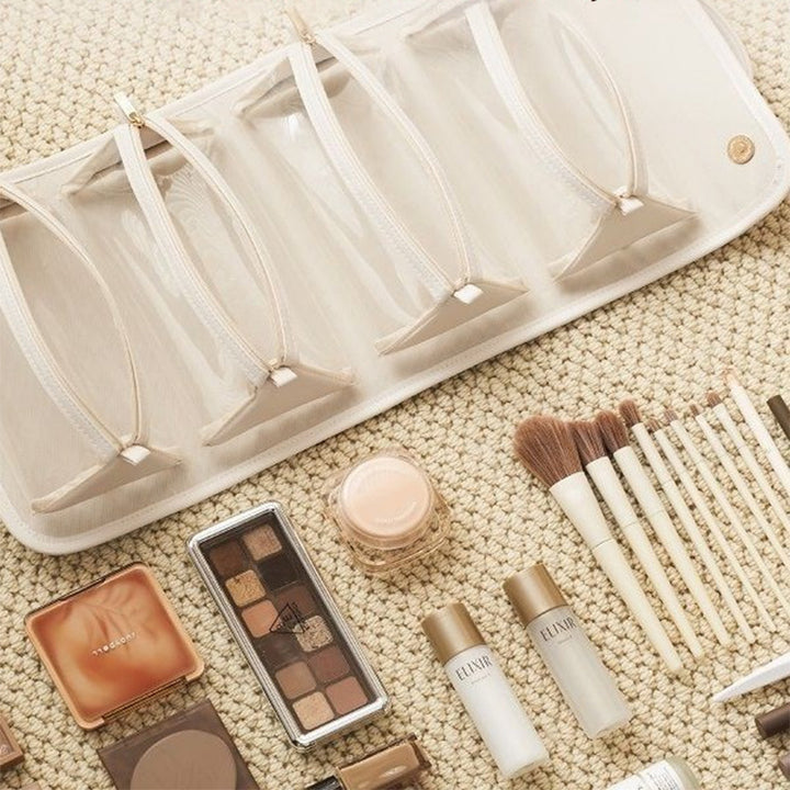 Foldable travel toiletry bag with clear pouches