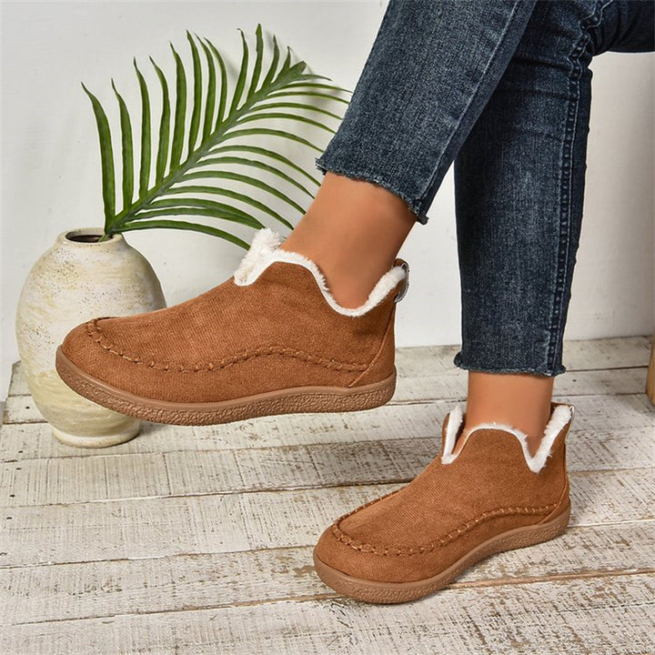 Flat faux suede ankle boots with V-cut