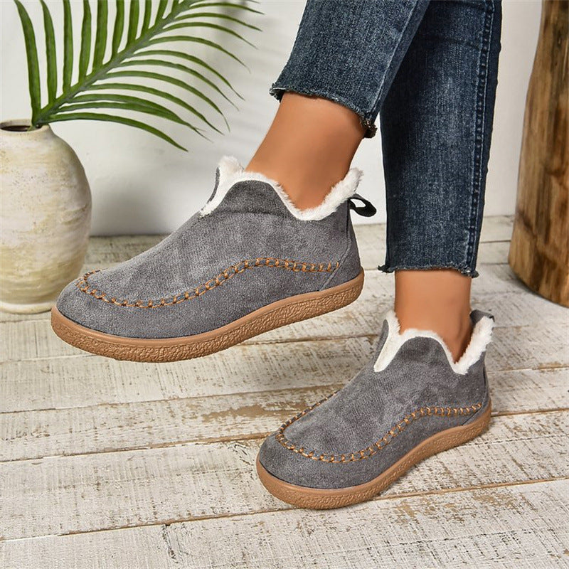 Flat faux suede ankle boots with V-cut
