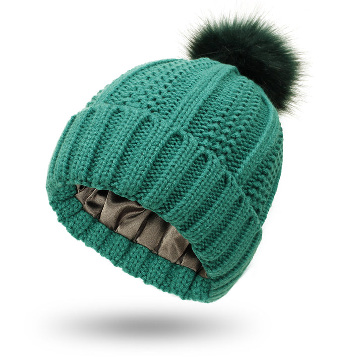 Chunky knit beanie with faux fur pom pom