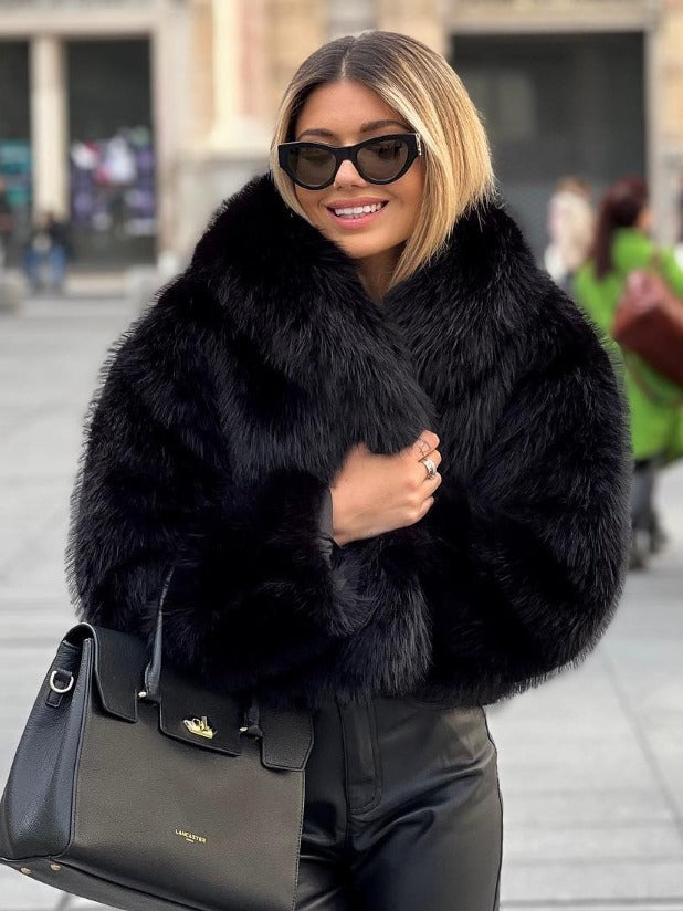Woman in cropped fluffy faux fur jacket
