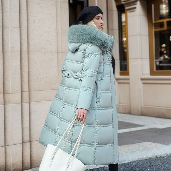 Woman in a long parka with faux fur hood