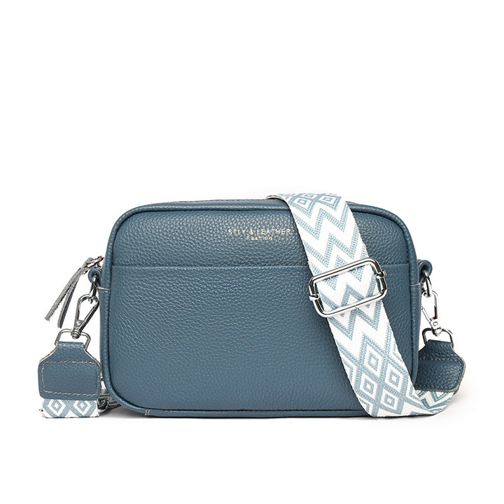 Small leather crossbody bag with patterned strap