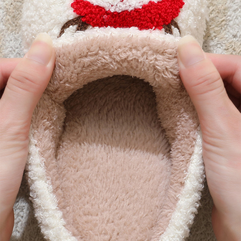 Fluffy Christmas slippers with Santa motif